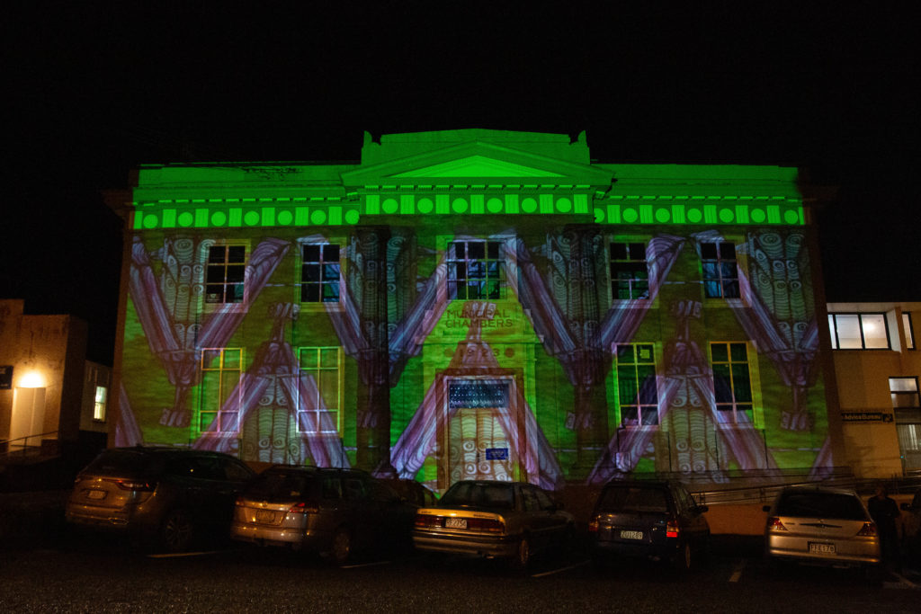 Projection mapping on a building in greens