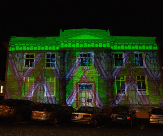 Projection mapping on a building in greens